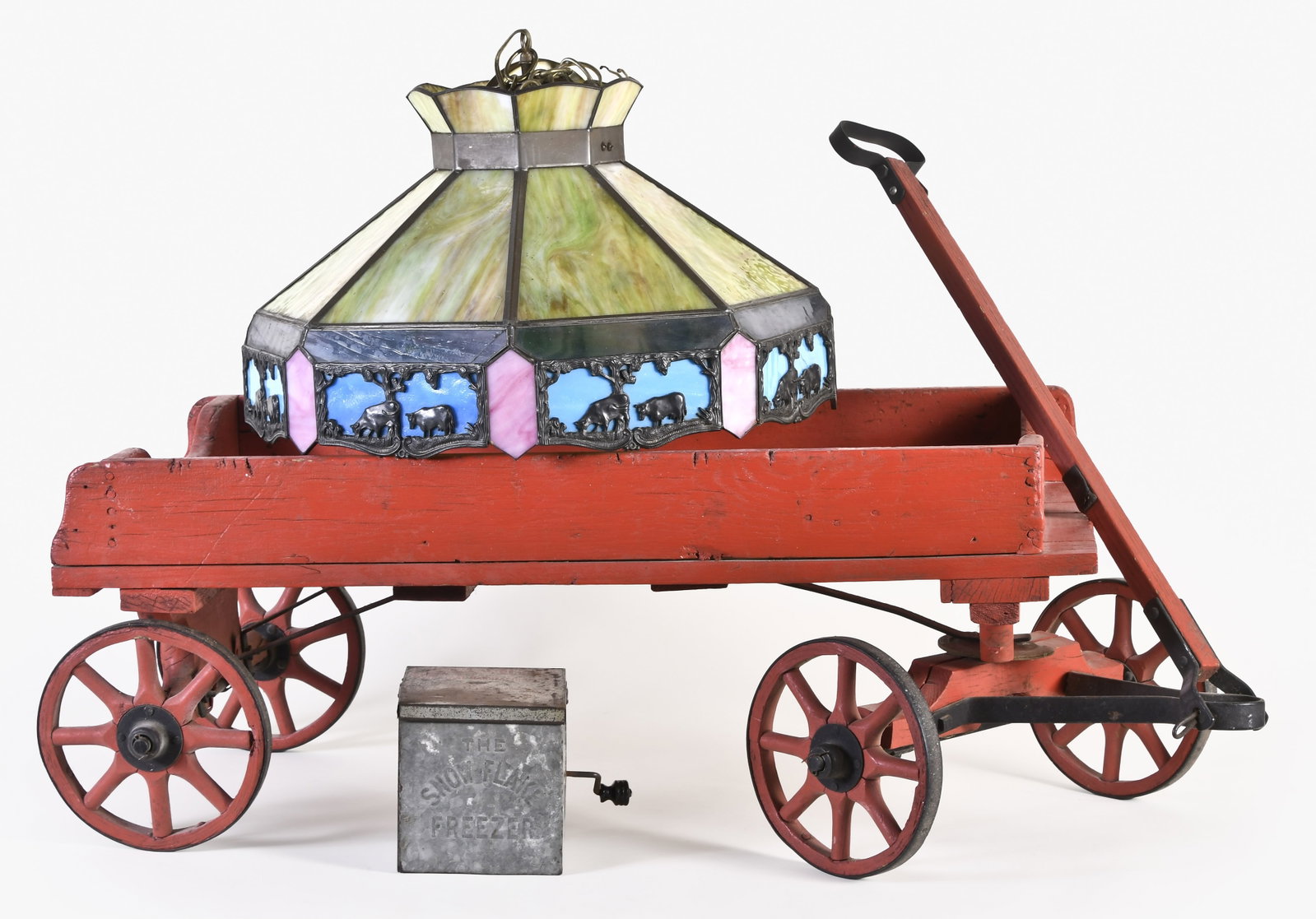 A lot of three antique items including an early to mid 20th century hanging slag glass lamp shade: 3 (Three) antique items, including an early - mid 20th century hanging octagonal multicolor slag glass lamp shade with metal overlay featuring grazing cattle, a Snow Flake Mfg. Co. "Snow Flake Freezer