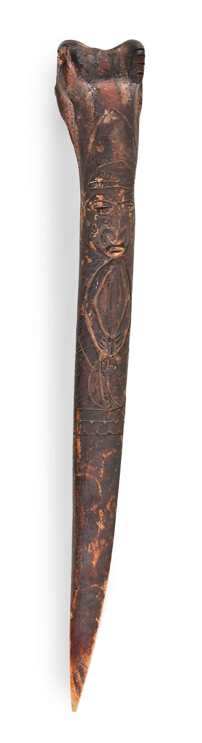 A late 19th - early 20th century carved cassowary bone dagger from New Guinea (1 of 6)