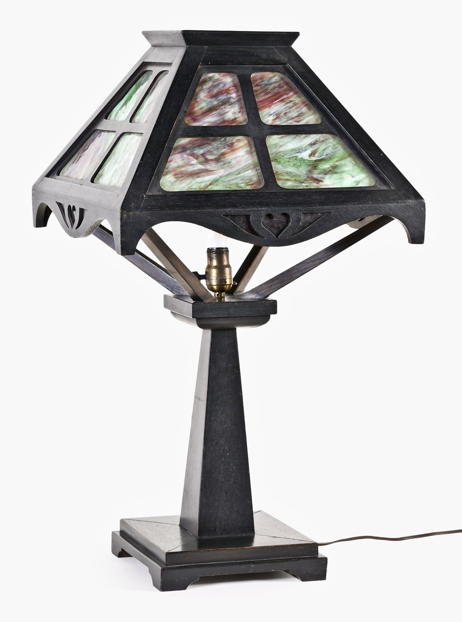 An early 20th century oak Arts and Crafts style table lamp: An early 20th century oak Arts and Crafts style table lamp, with stepped square base supporting a conforming tapered column below a square, molded platform with tapered supports for the four sided sha