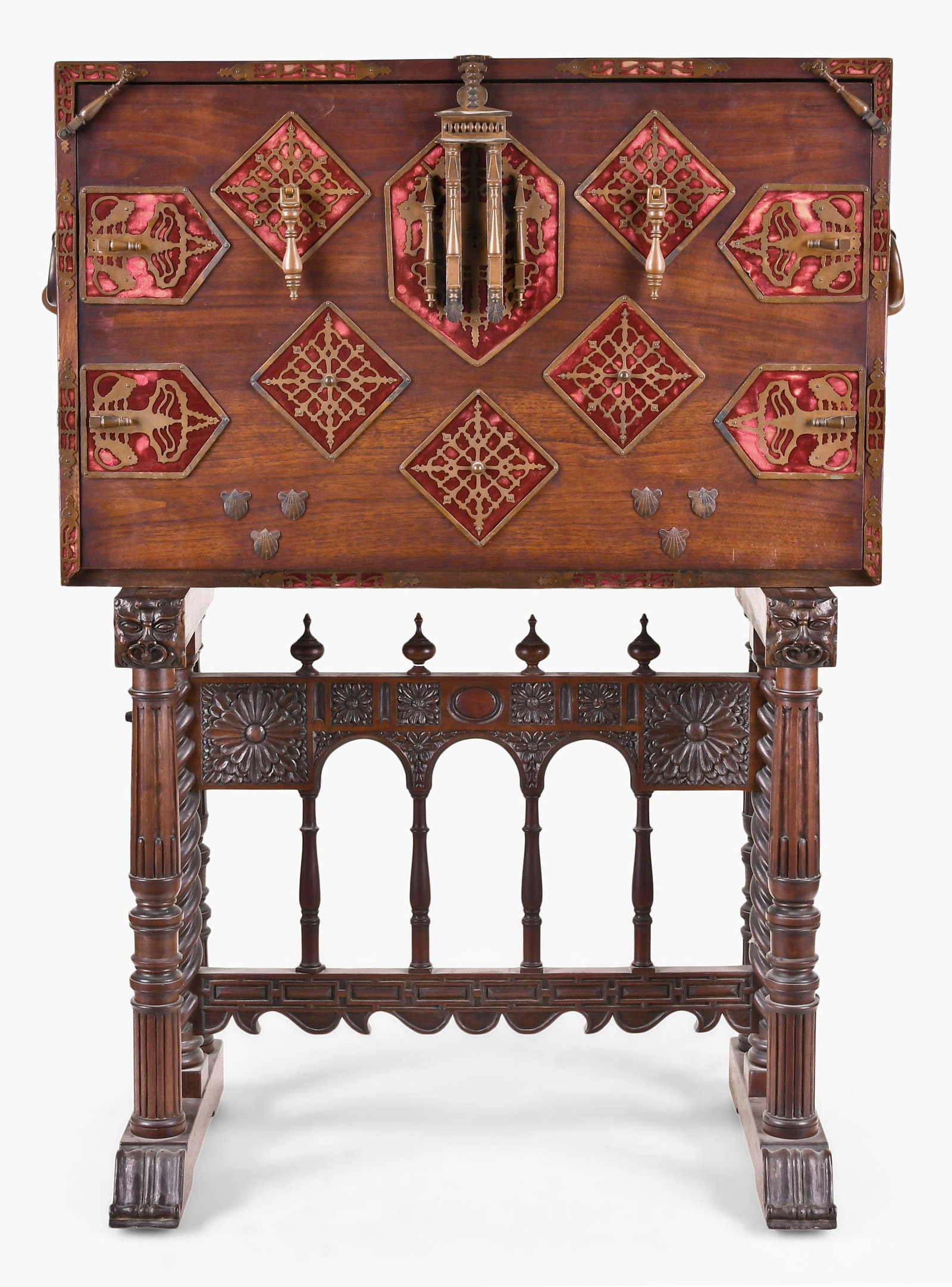 A 20th century reproduction of a 17th century vargueno writing cabinet: A 20th century reproduction of a 17th century vargueno writing cabinet, hardwood case with velvet backed brass mounts and heavy, cast carrying handles, the interior having two banks of drawers with mo