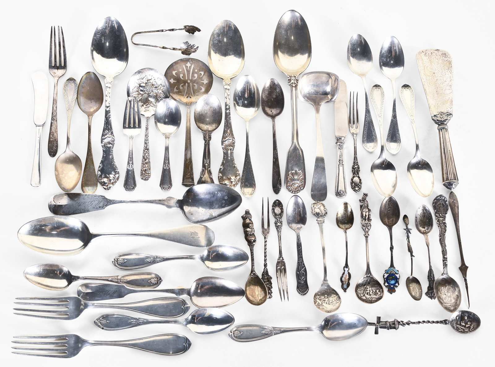 A lot of miscellaneous sterling and coin silver flatware (1 of 10)