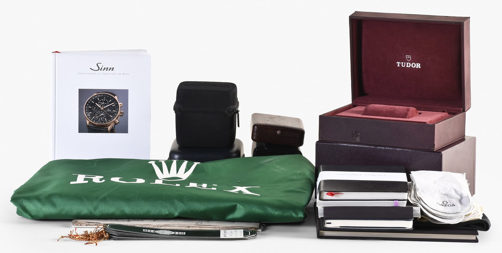 A lot of horological ephemera: A lot of horological ephemera including a green Rolex banner measuring 38 x 96, a group of plates from Rees's Encyclopedia, a Royal Mail "Marine Timekeepers" postage stamp set featuring Harrison's H4,