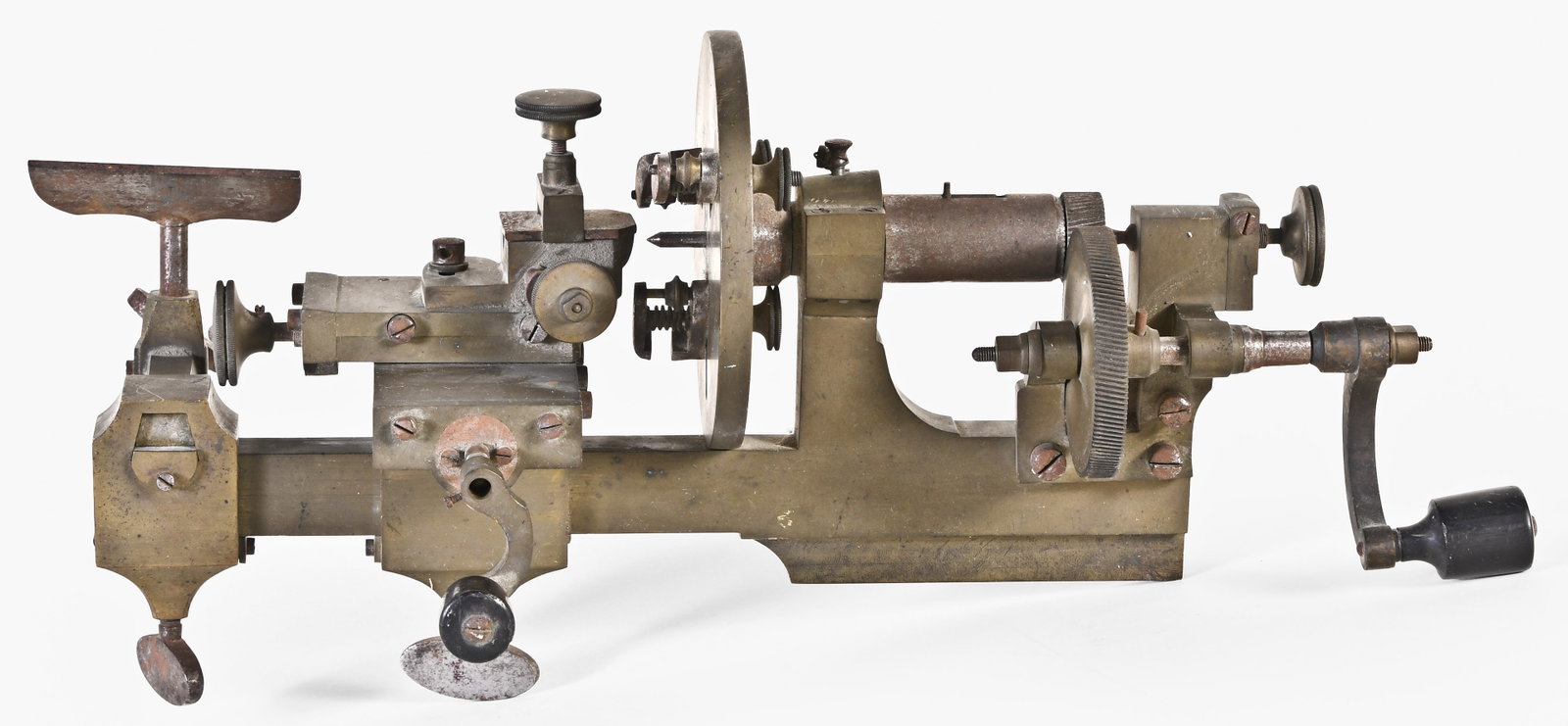 A late 19th century Swiss watchmaker's mandrel: Switzerland, a late 19th century watchmakers mandrel, of brass and steel construction, with slide and T rests, headstock with faceplate and pump center