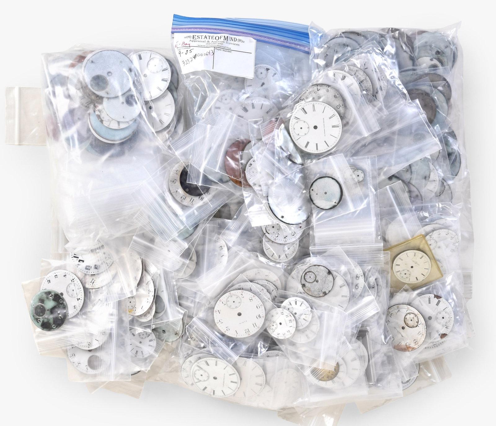 A very large lot of American and Swiss enamel and metal wrist and pocket watch dials: A very large lot of American and Swiss enamel and metal wrist and pocket watch dials, makers including Elgin, Howard, Waltham, Illinois, Ball, and others