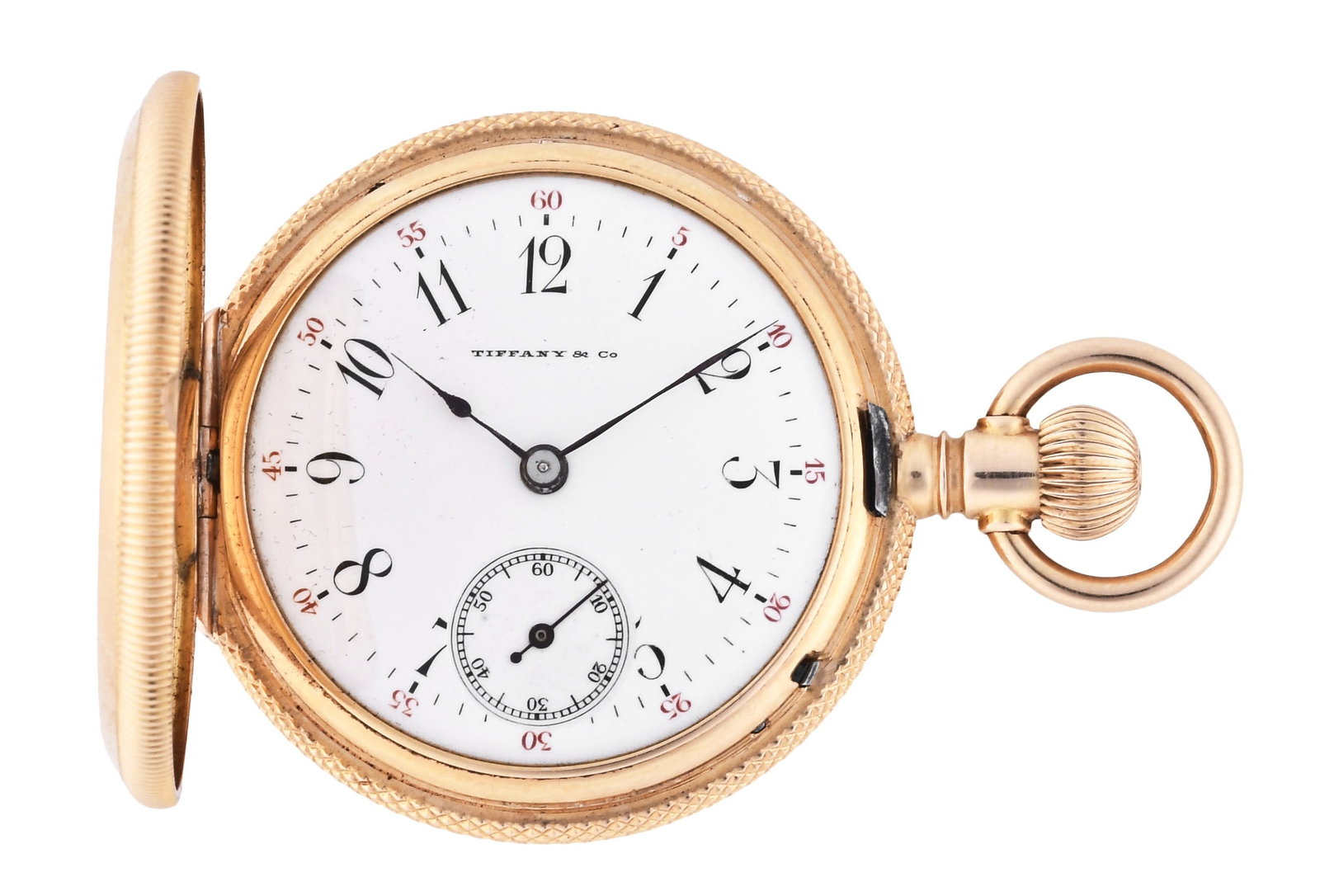A lady's 18 karat gold pendant watch signed Tiffany & Co.: Switzerland, for Tiffany & Co., New York, a lady's gold pendant watch, 16-17 jewel, stem wind and lever set, cotes de Geneve decorated rhodium plated movement with lever escapement and cut bimetallic 