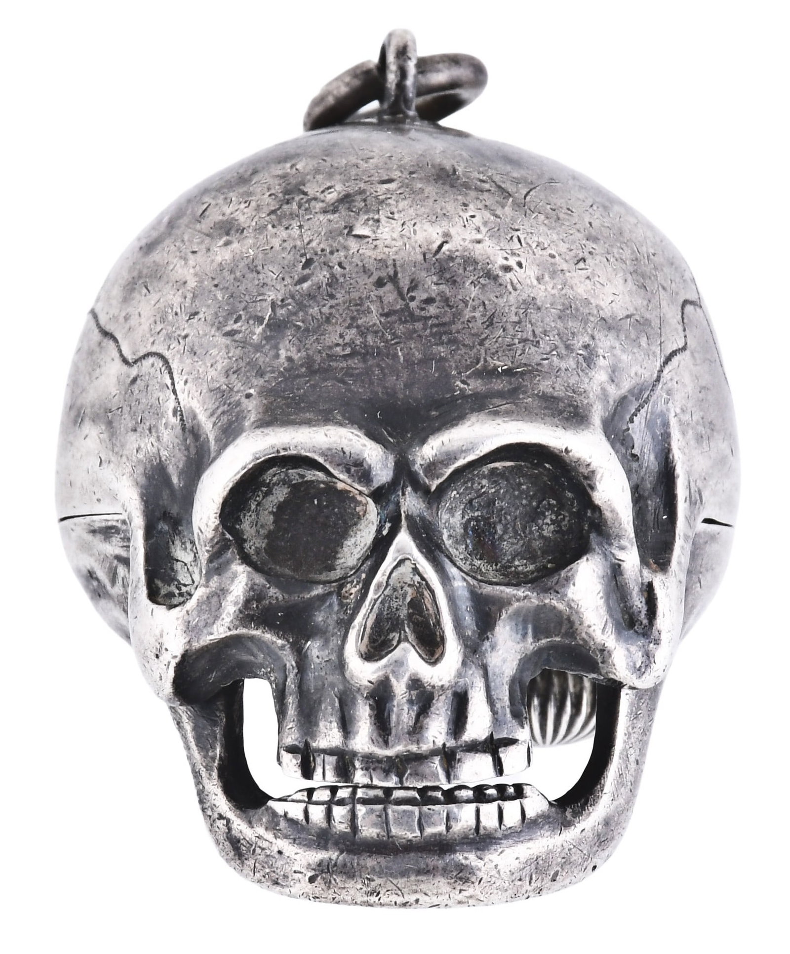 A late 19th century silver skull form Hamlet pendant watch attributed to Ditisheim: Attributed to Paul Ditisheim, Switzerland, an early 20th century "Hamlet" skull form pendant watch, 10 jewel, stem wind gilt plate movement with cylinder escapement in an .875 silver skull form case, 