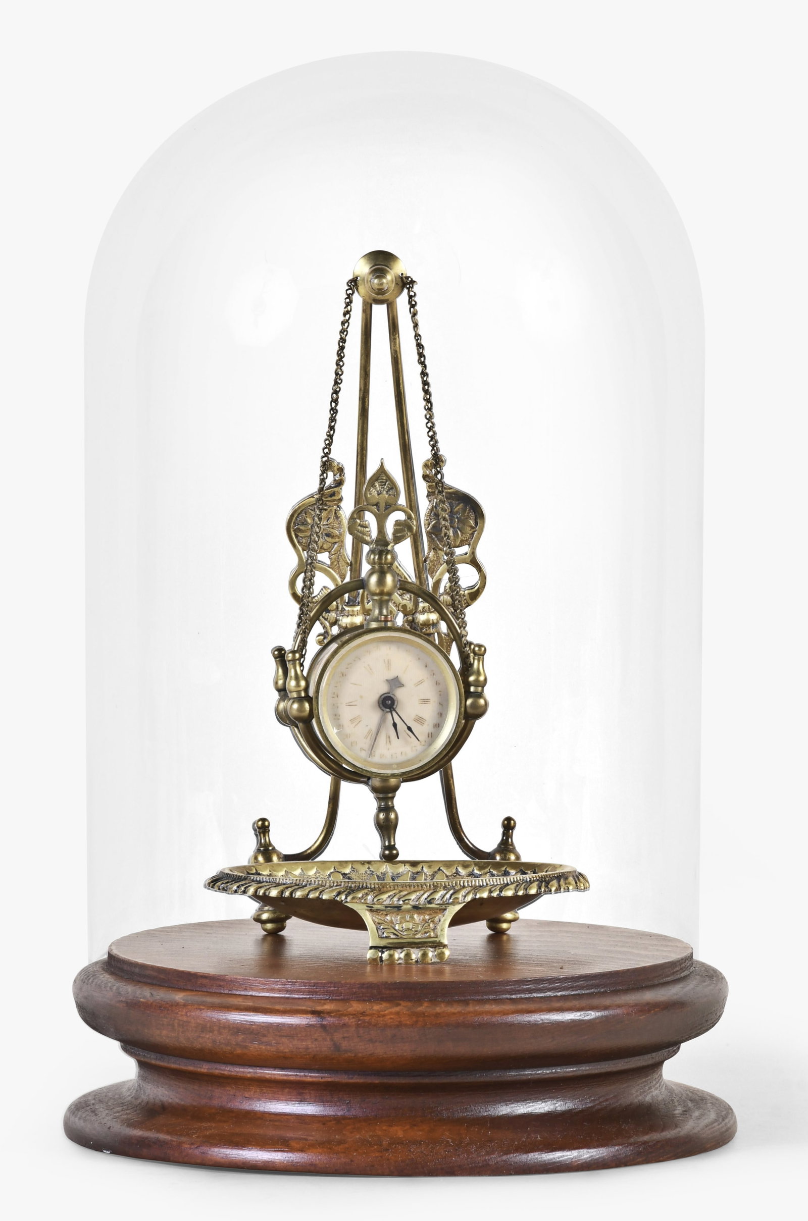 A Parker Clock Co. No. 11 desk timepiece: Parker Clock Co., Meriden, Conn., "No. 11" with calendar desk timepiece, one day, in a well made cast brass case, a trinket tray at bottom, and the clock hanging from 2 chains.