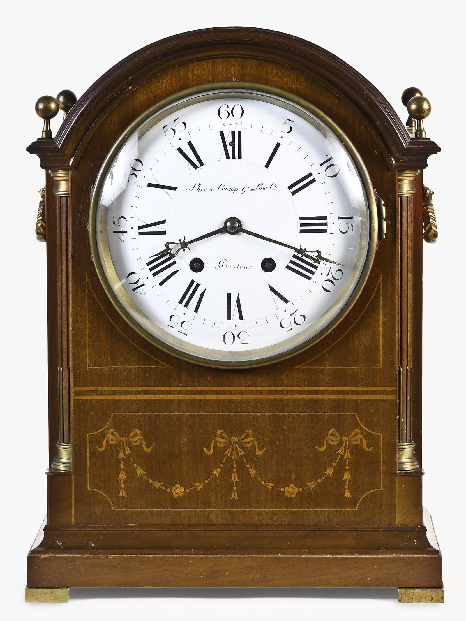 France, for Shreve, Crump & Low, English style bracket clock: France, for Shreve, Crump & Low, Boston, Massachusetts, English style bracket clock, mahogany arch case on rectangular brass feet with molded base, front with stop fluted quarter columns and fascia wi