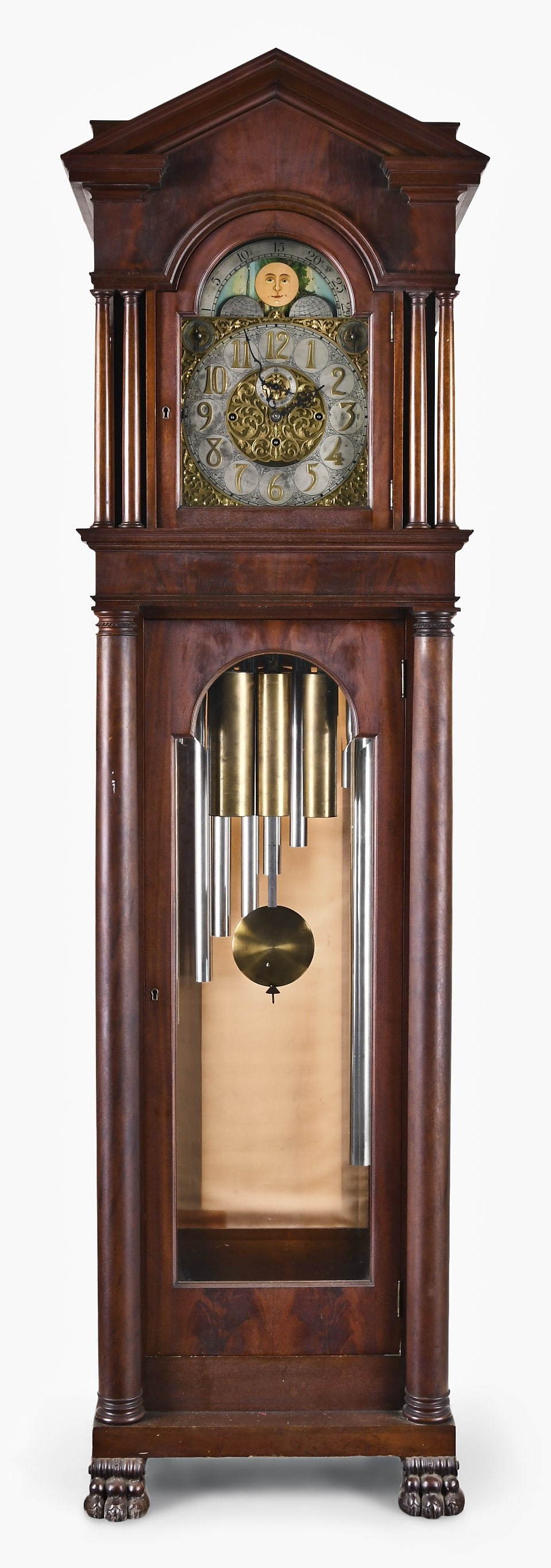 A German chiming hall clock: Mathias Bauerle, St. Georgen, Germany, chiming hall clock manufactured for Benjamin Stafford Newton in a very impressive architectural mahogany case, pediment top above four fully turned columns on
