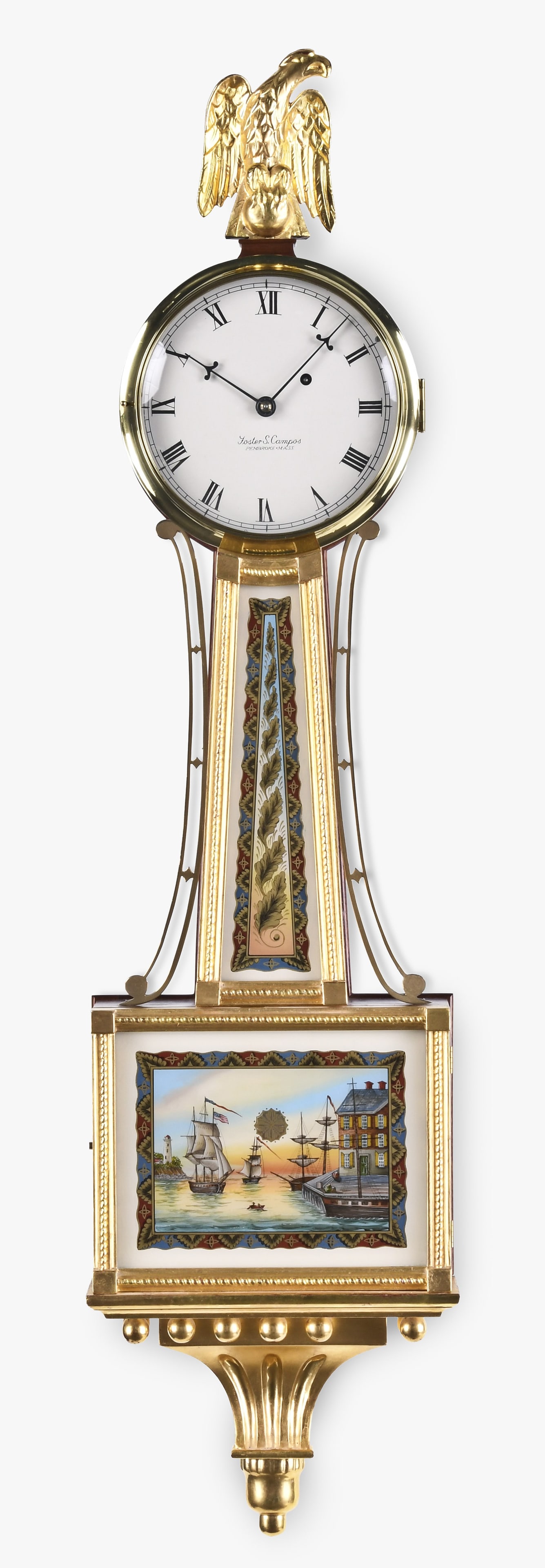 Foster Campos banjo clock: Foster Campos, Pembroke, Mass., patent time piece or banjo clock, mahogany and gilt case, painted metal dial, barbed hands, 8 day, weight driven brass movement, Case is stamped "10" and "85"