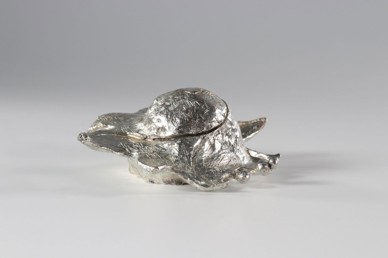 Christofle et Cocteau sculpture signed and numbered.: Christofle et Cocteau sculpture signed and numbered.Sizes: L=100mmWeight (K): 0.245kgState: After checking - good condition - no restoration - no repairAuthor / artist: CHRISTOFLE et Cocteau