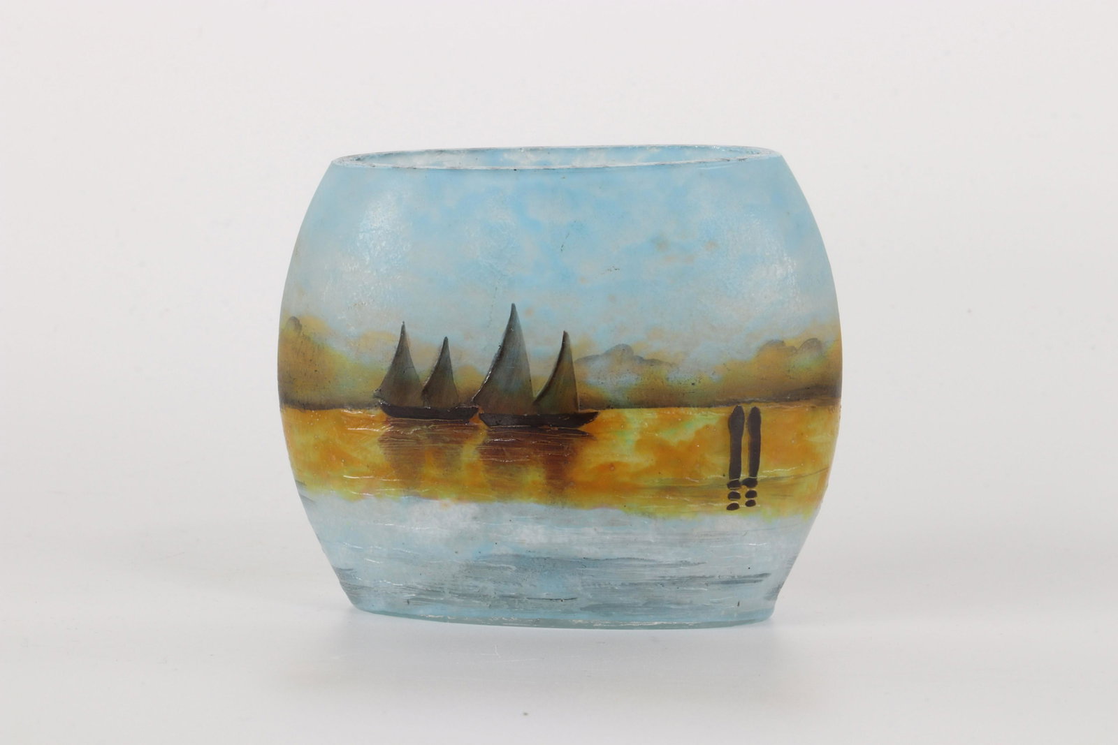 DAUM Nancy vase The Venetian lagoon glass with: DAUM Nancy vase The Venetian lagoon glass with polychrome enamel decoration and grisaille, the base released with acid Region: France Sizes: H=80mm L=100mm l=55mm Weight (K): 0.190kg State: After chec