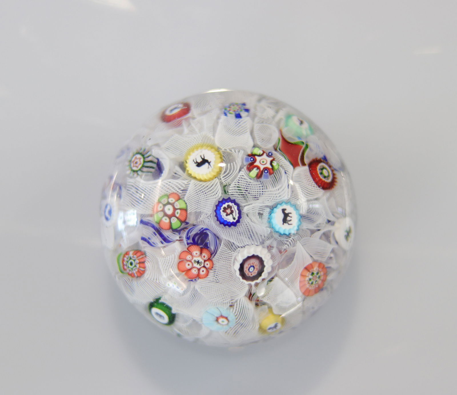 Baccarat paperweight decorated with 19th century canes (1 of 2)