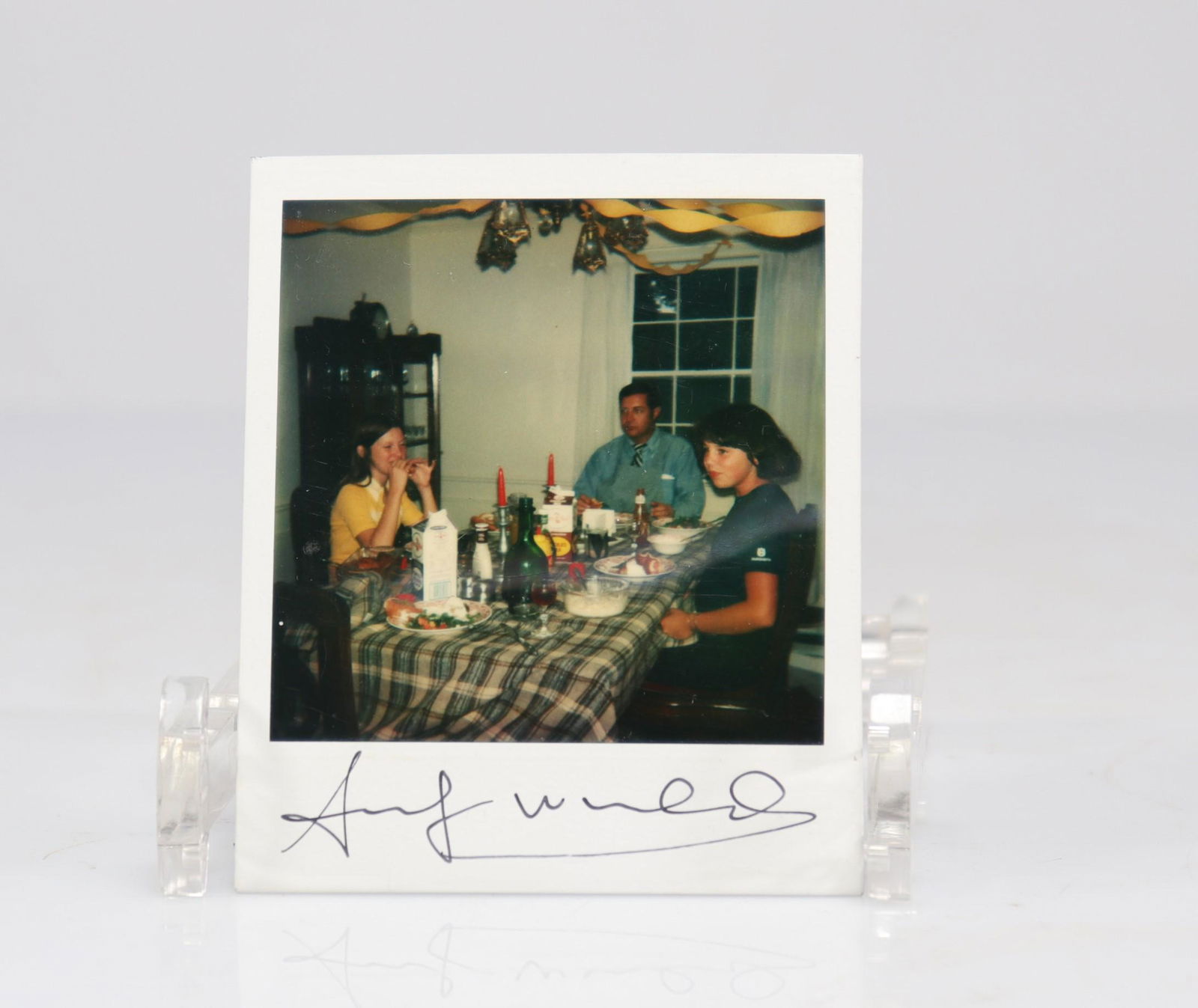 Andy Warhol. Family portrait. Polaroid. Signed "Andy Warhol" in marker on the front. (1 of 2)