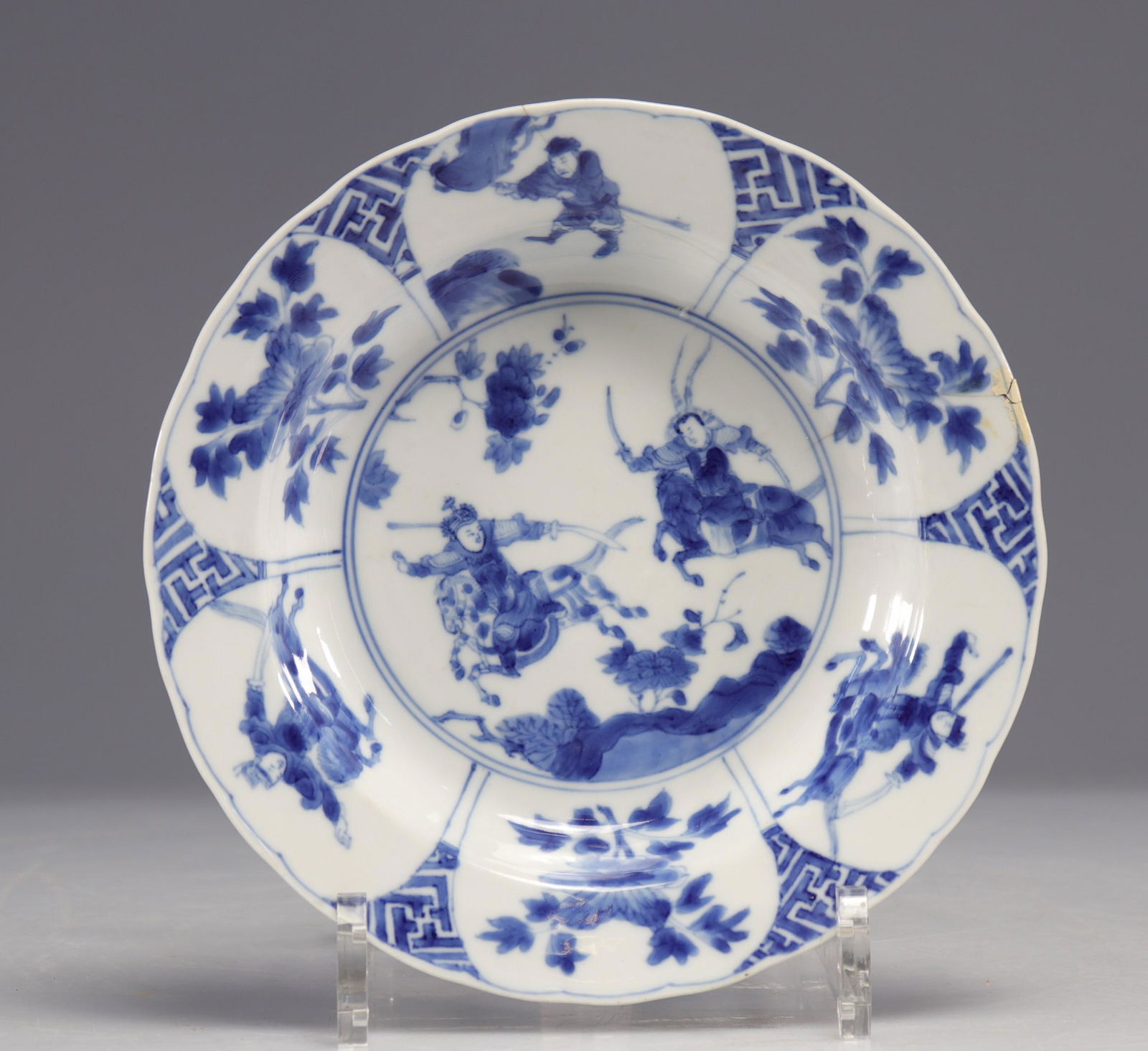 Blue white porcelain plate decorated with Kangxi mark and period warriors (1 of 2)