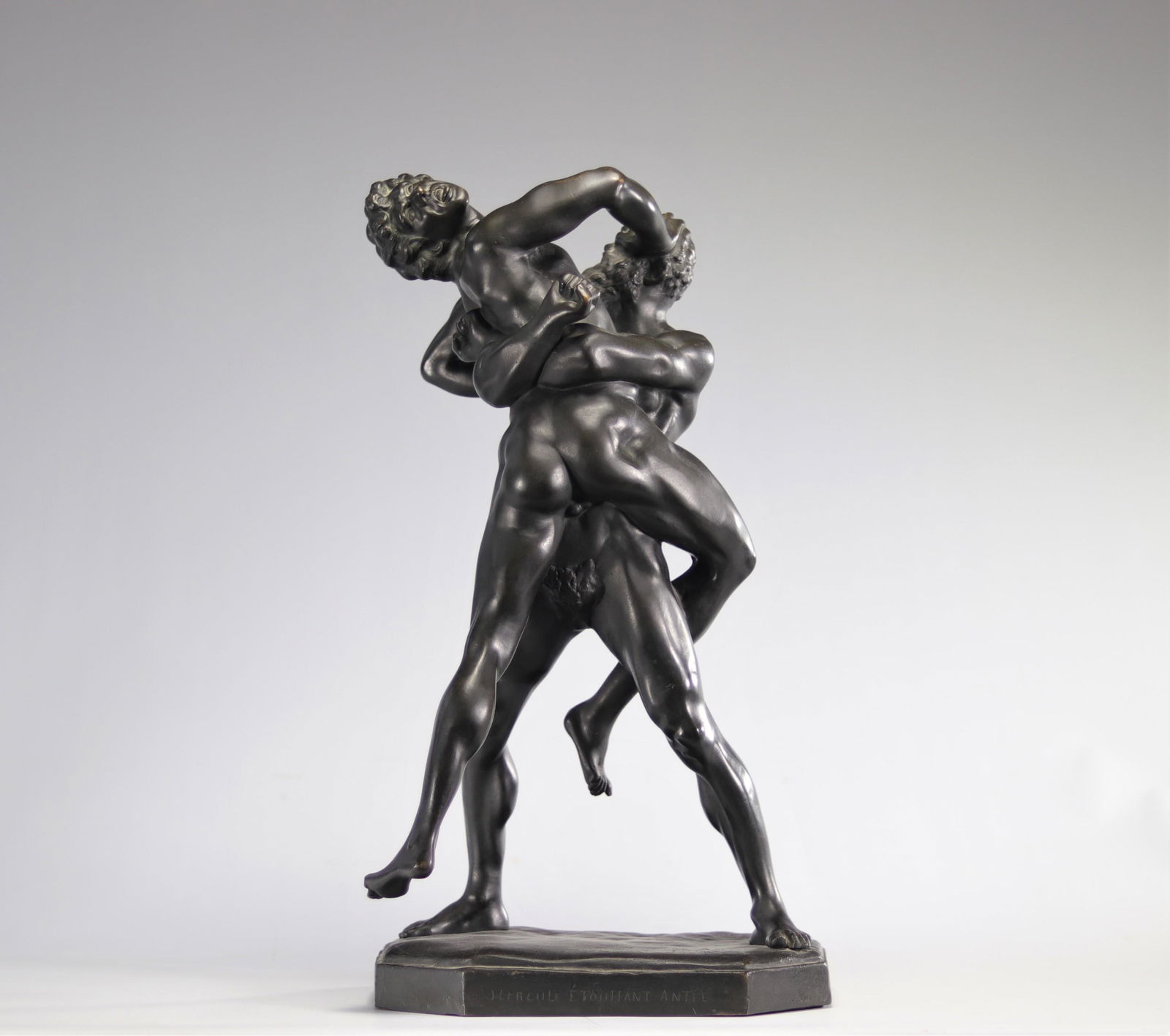 Group representing Hercules and Antaeus in black patina bronze on a triangular base, resting on (1 of 6)