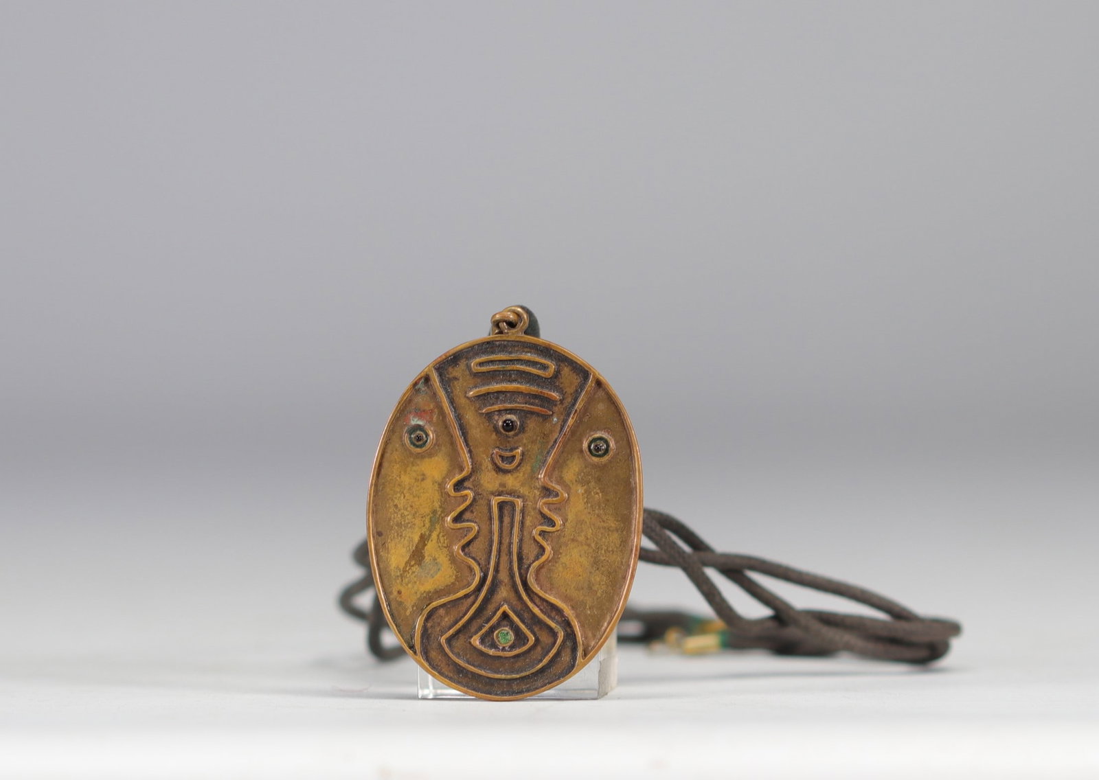Jean Cocteau (1889 -1963).  "Double visage".  Circa 80.  Necklace in bronze, green enamel, green (1 of 3)