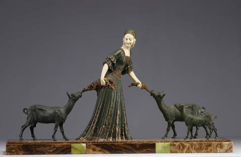 Demetre CHIPARUS (1886-1947) "Elegant with goats", large sculpture in regulated.: Demetre CHIPARUS (1886-1947) "Elegant with goats", large sculpture in spelter and celluloid on a terrace in onyx and marble marquetry. CHIPARUS is known mainly for its bronze and ivory sculptures