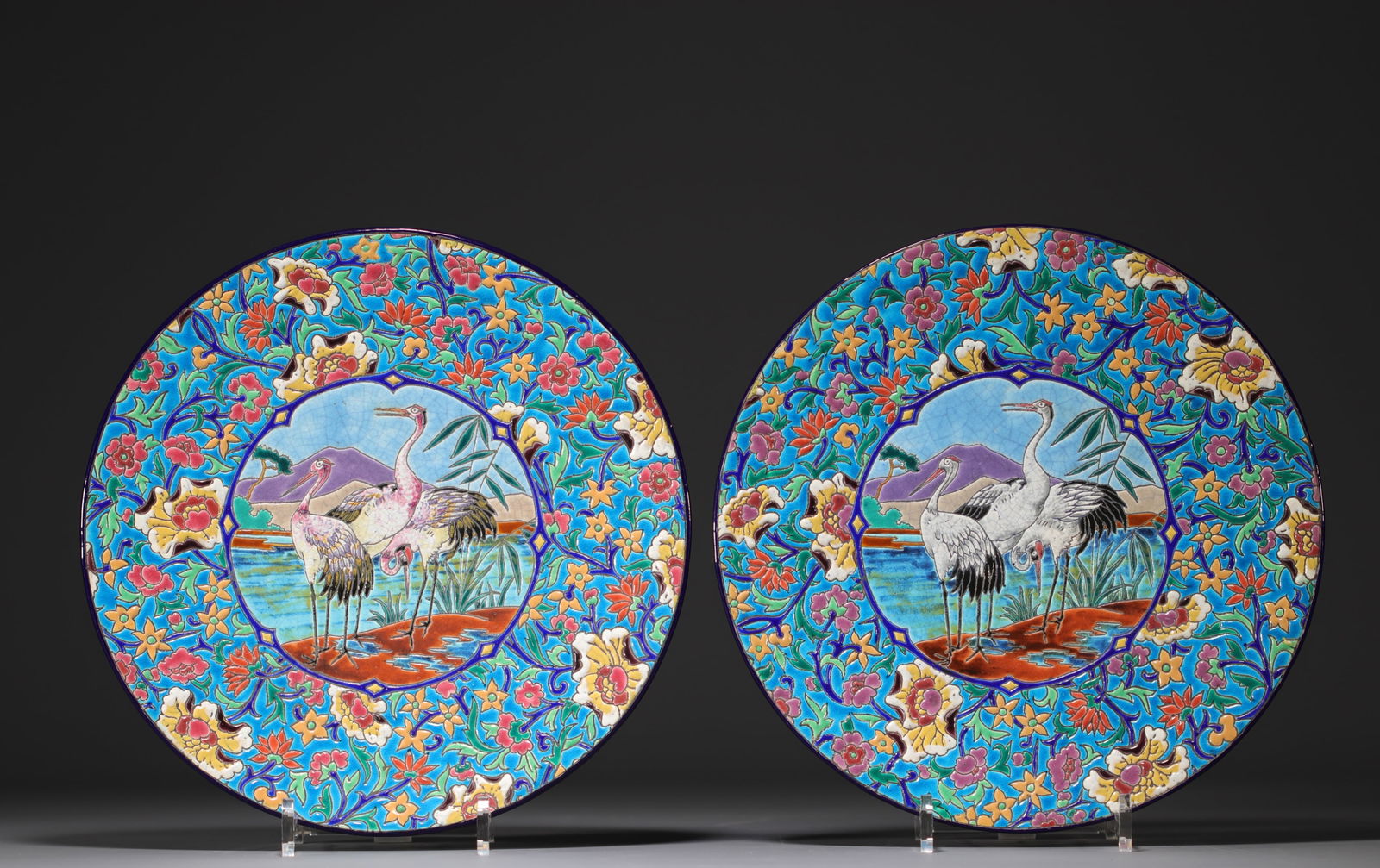 Longwy - Pair of large enameled plates decorated with cranes. (1 of 3)