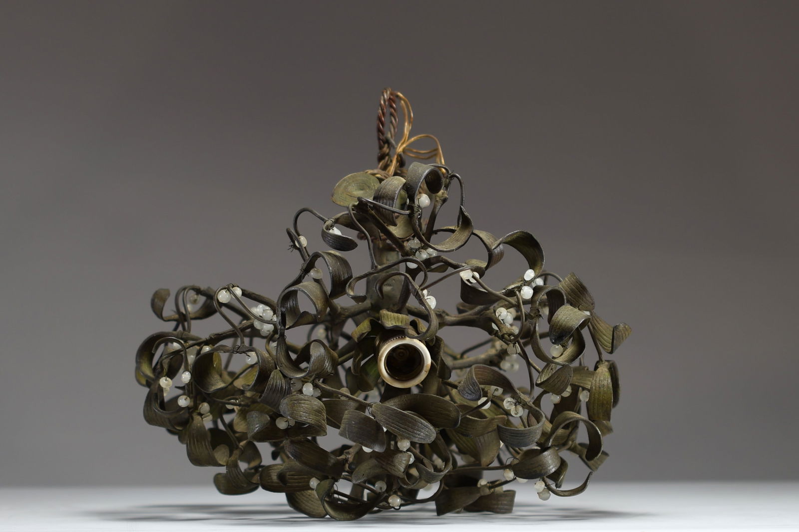 A three-light bronze chandelier with a green patina and opaline glass, representing a mistletoe (1 of 4)