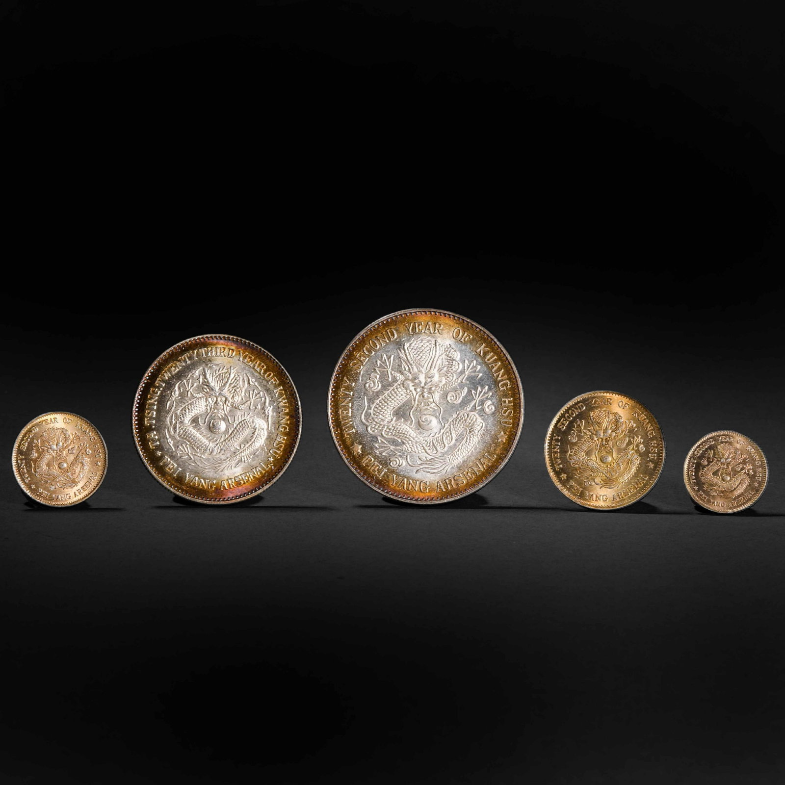 A GROUP OF QING DYNASTY SILVER COINS (1 of 9)
