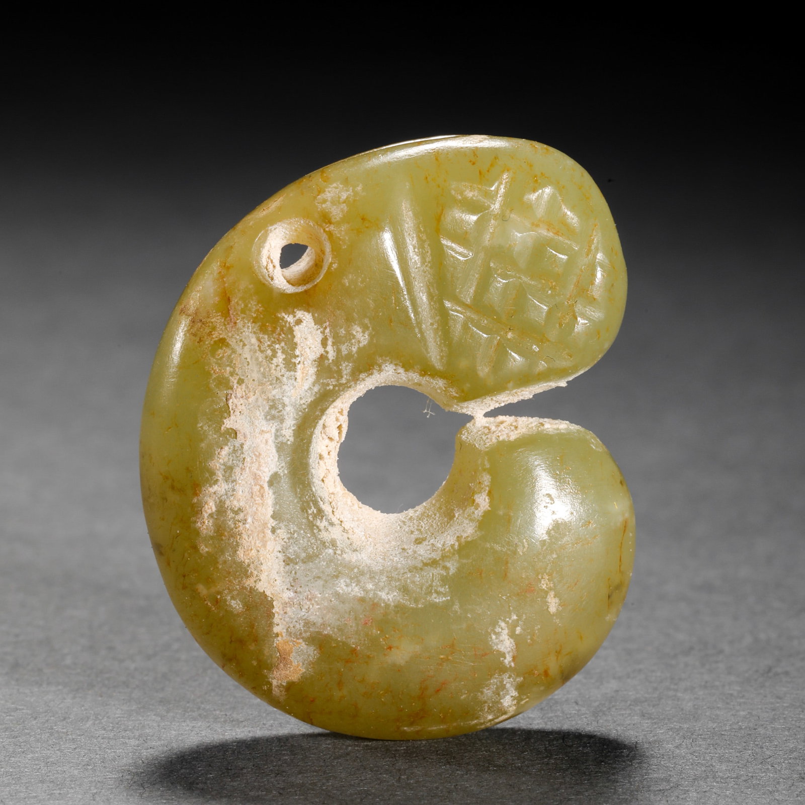 Jade pig dragon of Hongshan culture, Hongshan period, China: L. 3.7 cm. W. 3.1 cm. Weight 17 gram.