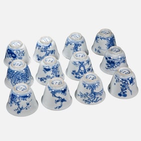 A set of blue and white twelve flower god cups from the Kangxi period of the Qing Dynasty, China