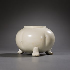 A Chinese Tang Dynasty Xing kiln white porcelain tripod censer with the character "Ying"