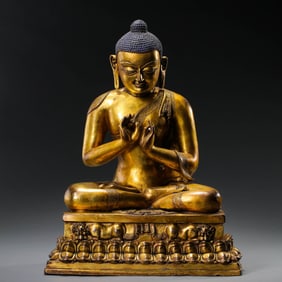 A Chinese Ming Dynasty Gilded Bronze Statue of Sakyamuni Buddha
