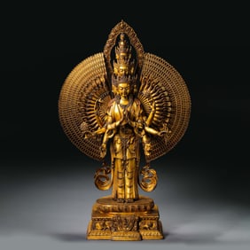 A Chinese Qing Dynasty Gilded Bronze Thousand-Armed Guanyin Standing Figure