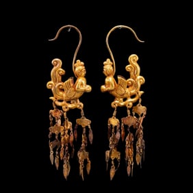 A pair of pure gold earrings from the Liao Dynasty, China