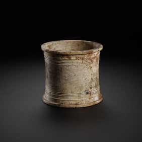 Chicken bone and white jade artifacts from the Neolithic period of China