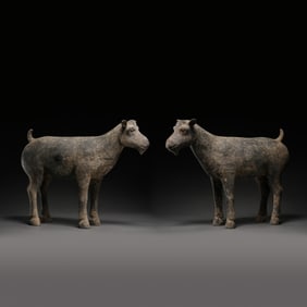 A pair of Chinese Han Dynasty black pottery sheep