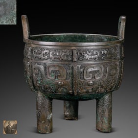 Chinese Shang and Zhou Dynasty animal-faced double-handled tripod censer