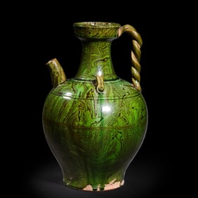 Chinese Tang Dynasty green glaze twisted pot with double handles