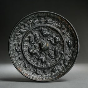 Bronze mirror with sea beasts and grapes, Tang Dynasty, China