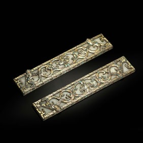 A pair of gold, silver and jade inlaid town figurines from the Warring States Period of China