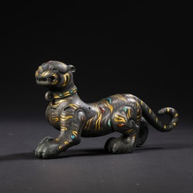 Auspicious beasts inlaid with gold and silver and gemstones during the Warring States Period of