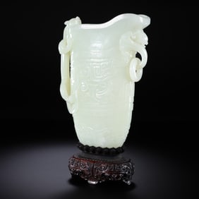 Chinese Qing Dynasty Hetian white jade goblet with animal face pattern
