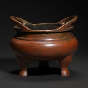 Chinese Ming Dynasty copper stove with two handles and three legs