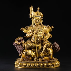 A Chinese gilt bronze statue of a seated Buddha from the Kangxi period of the Qing Dynasty