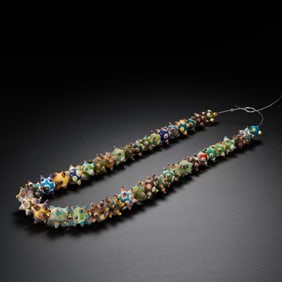 Dragonfly eye necklace, 12th century AD
