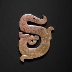 S-shaped Hetian jade dragon, from about 200 BC or later