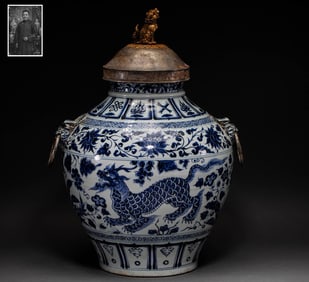 A large silver-inlaid blue-and-white jar with animal designs from the Yuan Dynasty in the 14th