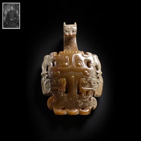 A Hetian jade belt hook with dragon design, 200 BC or later