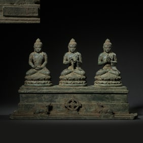 Seated statue of the Three Buddhas of Ancient India
