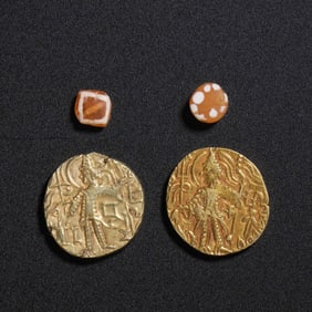Pure gold coins and agate beads from the Kushan period, circa 1st century AD