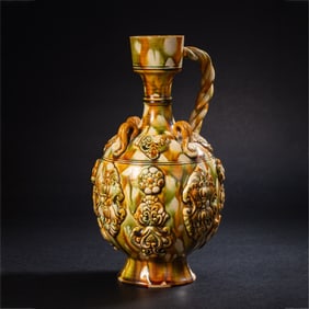 A tri-colored jar with a Tang Dynasty 8th century