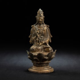 A gilt statue of seated Guanyin from the Liao Dynasty, 10th century AD