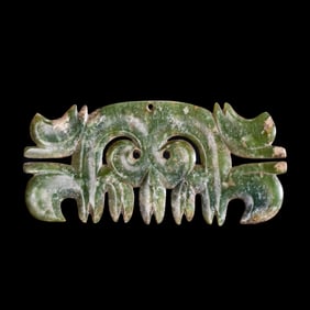 Neolithic Hongshan Culture 4000-3000 AD Green and yellow jade with toothed animal face decoration